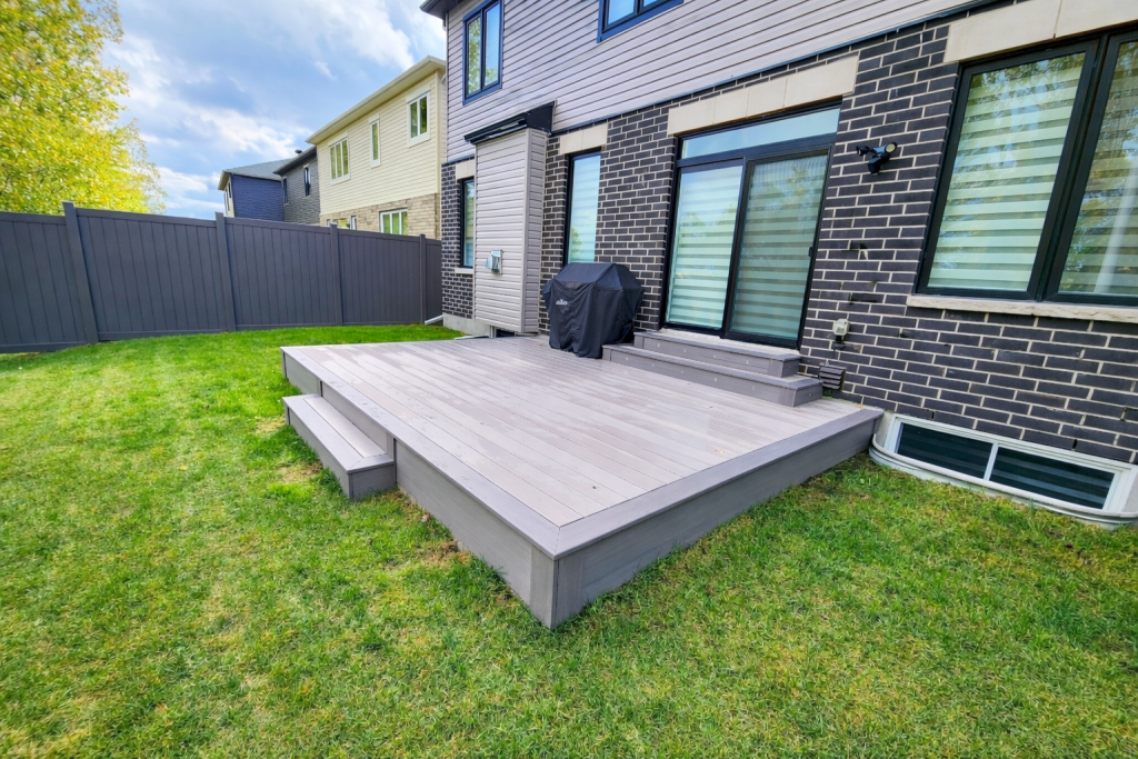Stunning Low-Maintenance TimberTech PVC Deck with Cascading Stairs and Recessed Lighting in Orleans, Ontario