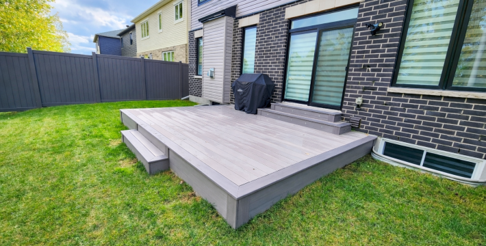 Stunning Low-Maintenance TimberTech PVC Deck with Cascading Stairs and Recessed Lighting in Orleans, Ontario